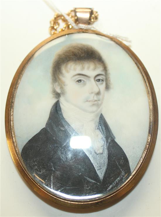 Attributed to John Barry (fl.1784-1827) Miniature of a young gentleman wearing a black jacket, clouds beyond, 2,75 x 2,25in.